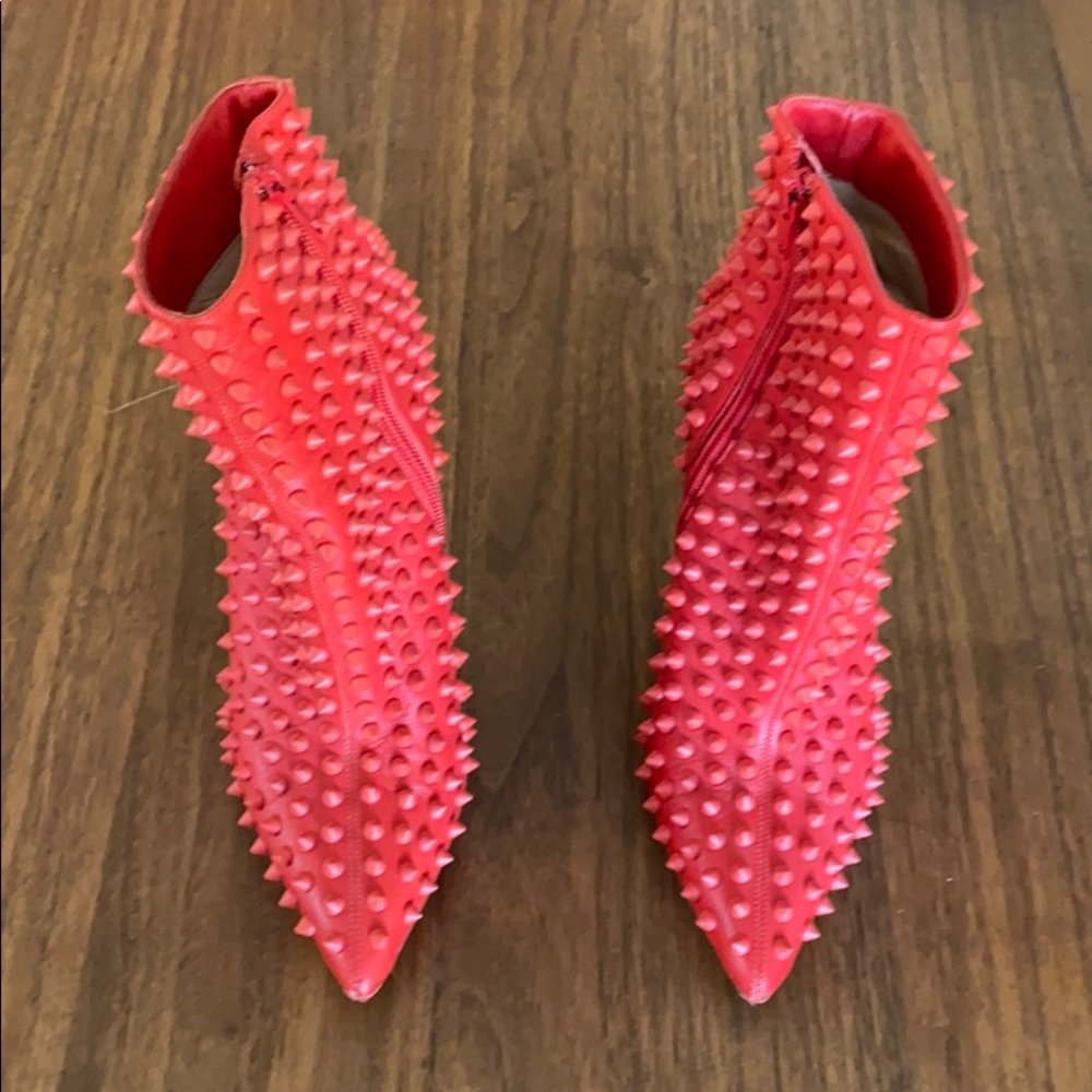 Spiked red Louboutin booties